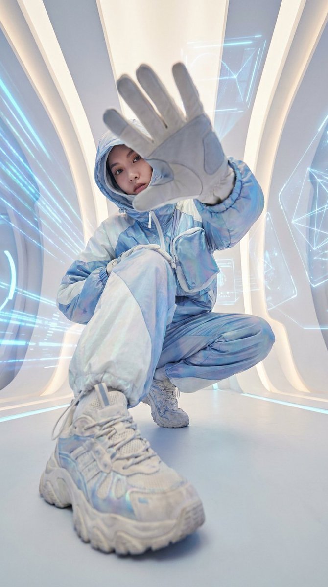 Ultra-premium fashion editorial featuring a model crouched e